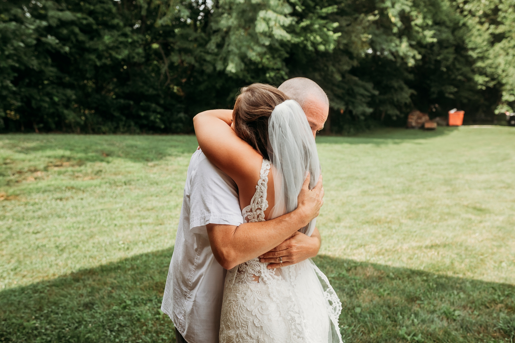 backyard wedding photography bates city missouri bride and groom brittany jewell photography father daughter first look