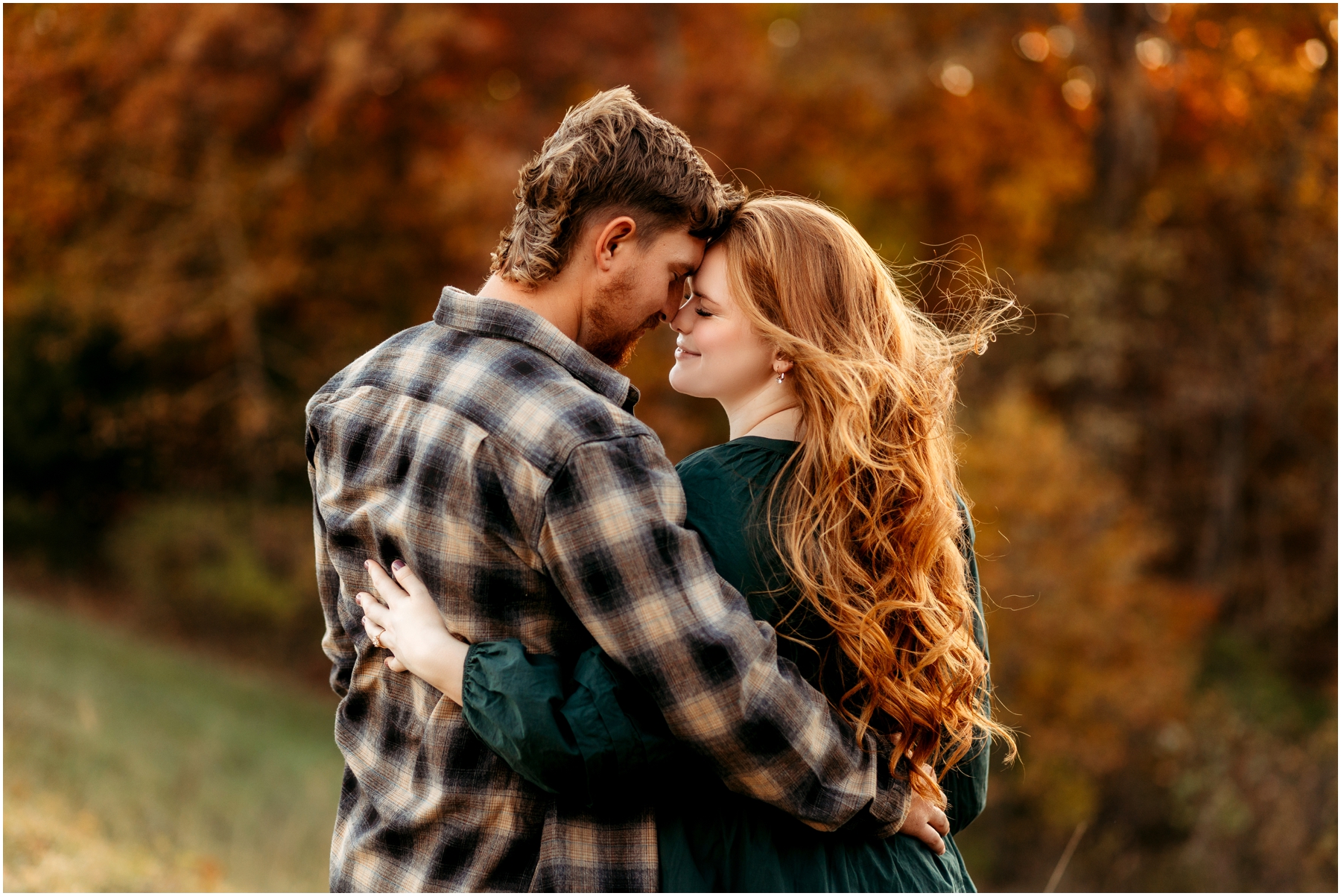 Faith and Stephen during their fall engagement session at Knob Noster State Park with Brittany Jewell Photography, surrounded by vibrant autumn foliage and scenic landscapes.