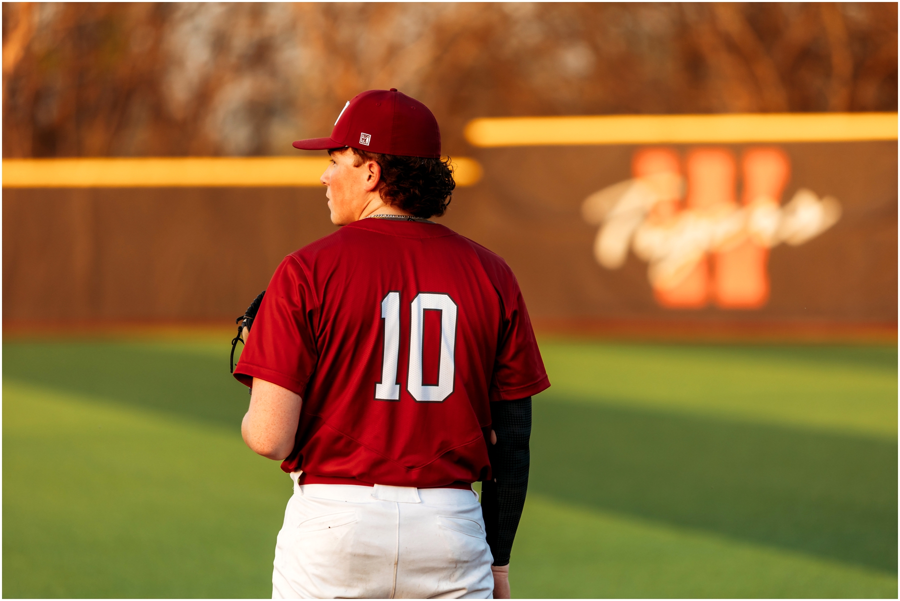 Warrensburg senior portraits of Ryan, featuring a blend of natural and sports settings with creative lighting effects, captured at Pertle Springs and WHS Baseball Field.