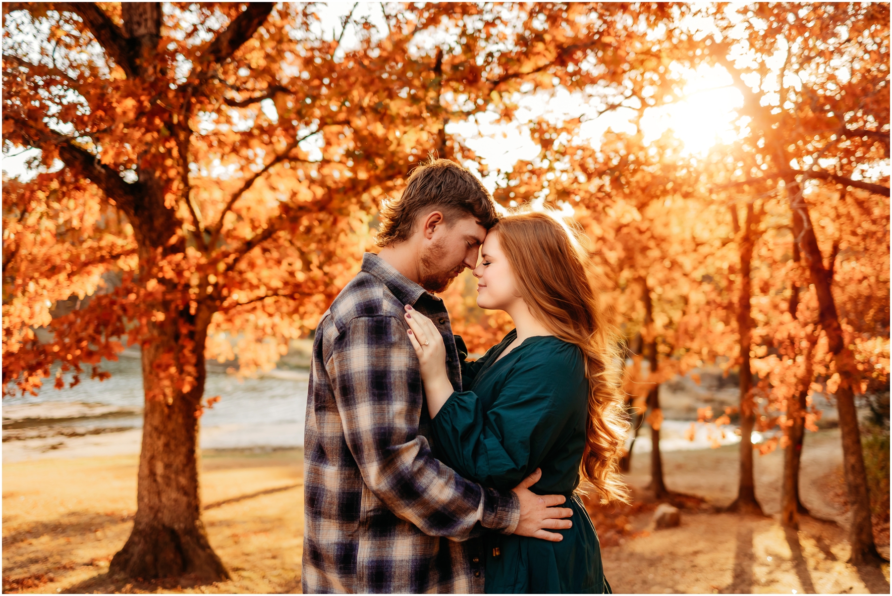Faith and Stephen during their fall engagement session at Knob Noster State Park with Brittany Jewell Photography, surrounded by vibrant autumn foliage and scenic landscapes.